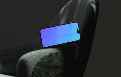 iPhone mockup on a modern fabric chair