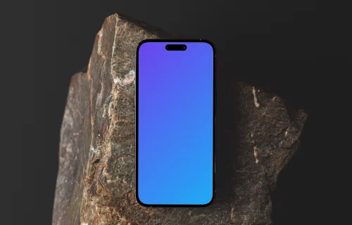iPhone mockup positioned on a textured rock surface