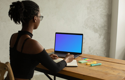 Lady typing on her MacBook Pro