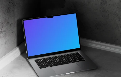 MacBook Air mockup in a minimalist concrete corner
