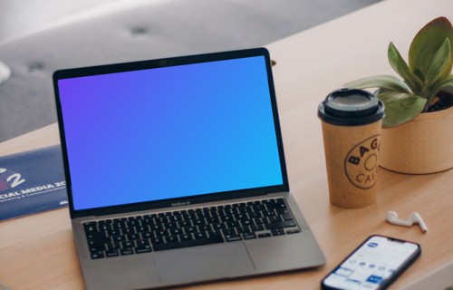 MacBook Air mockup next to the smartphone