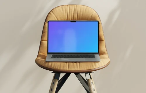MacBook Air mockup on a modern chair