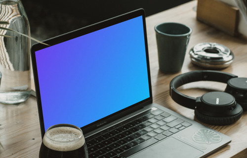 MacBook Pro 13 mockup on wooden desk