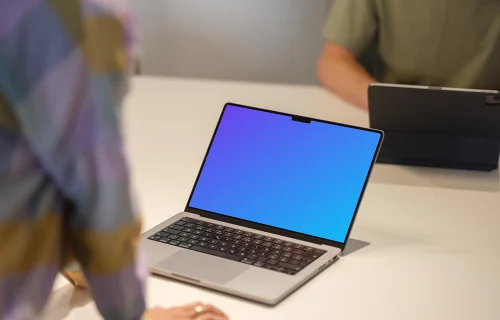 MacBook Pro 14 inch mockup on office desk with space for design