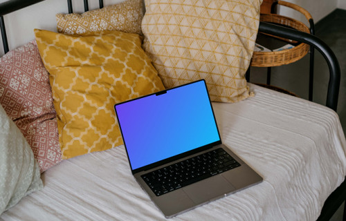 MacBook Pro mockup on a sofa