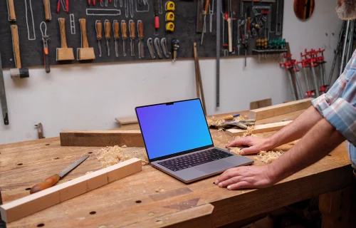 MacBook Pro mockup on a wooden desk
