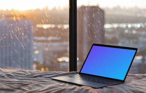 MacBook Pro mockup on bed