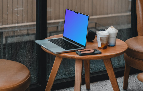 MacBook pro mockup on small table