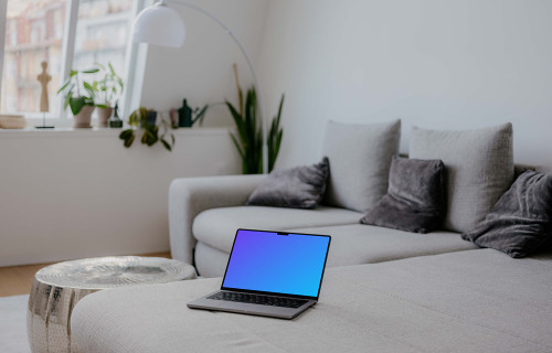 MacBook Pro mockup on the sofa