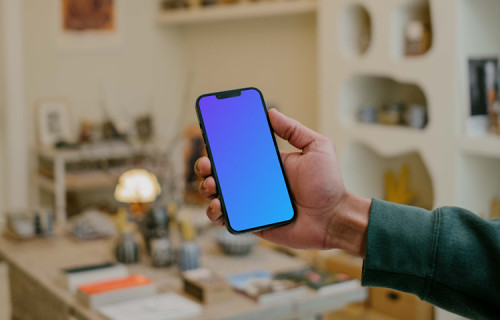 Man holding a smartphone mockup