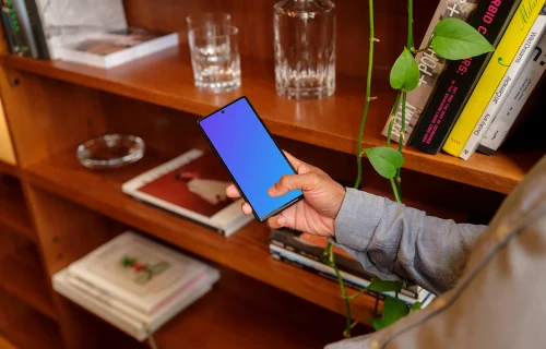 Man typing on Google Pixel mockup in the office