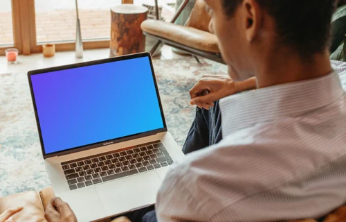 Man using a MacBook Pro mockup