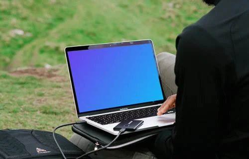 Man working on MacBook Pro mockup