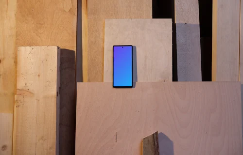 Mockup of Google Pixel 6 placed on wooden boards