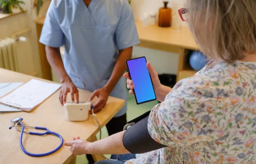 Patient holding a Google Pixel mockup