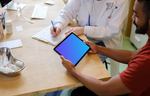 Patient holding an iPad Air in his hands