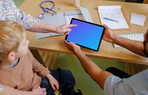 Pediatric doctor holding an iPad