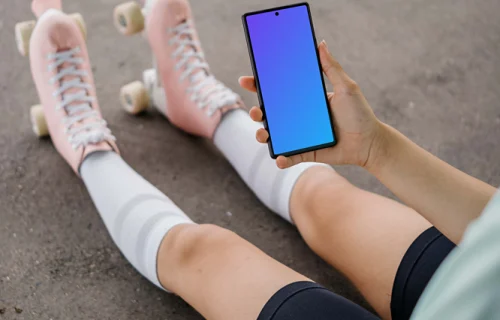 Person holding a phone mockup