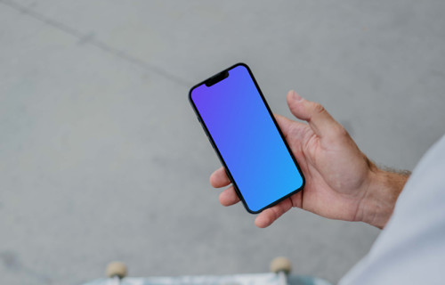 Skateboarder reading on phone mockup