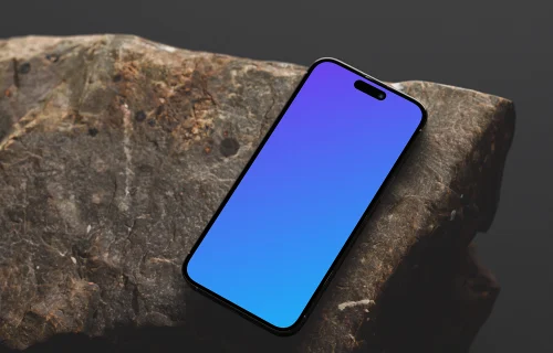 Smartphone mockup on a textured rock surface