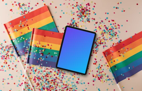 Tablet mockup among LGBT flags