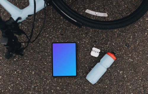 Tablet mockup next to the bike
