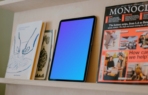 Tablet mockup on bookshelf