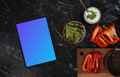 Tablet mockup on the marble kitchen unit