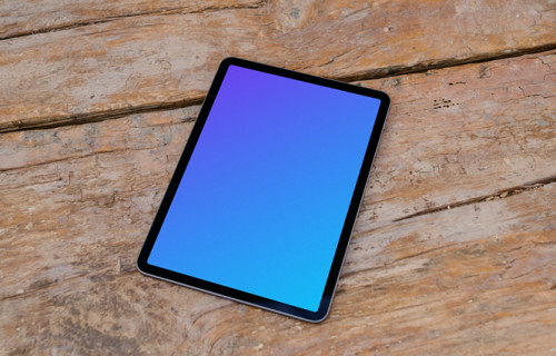 Tablet mockup on wooden table