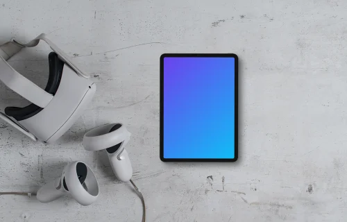 Tablet mockup with VR headset on textured background