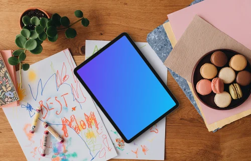 Tablet placed on scratched papers for Mother’s day