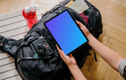 User holding a laptop mockup