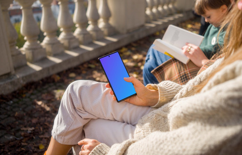 Woman hand scrolling on a phone mockup