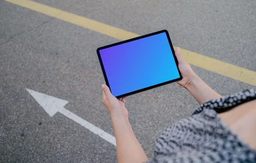 Woman hands holding an iPad mockup
