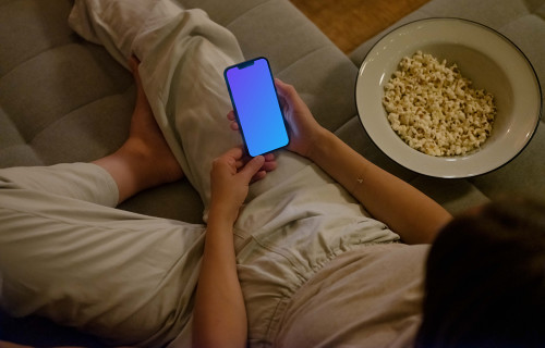 Woman hands holding an iPhone mockup