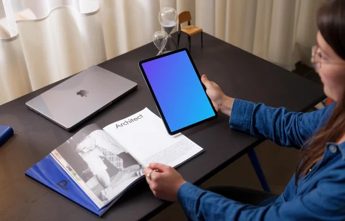 Woman holding an iPad Air mockup