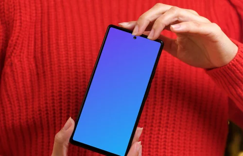 Woman in red sweater holding a Google Pixel 6 mockup