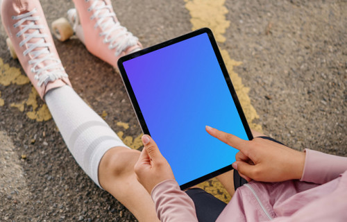 Woman pointing on an iPad Air mockup