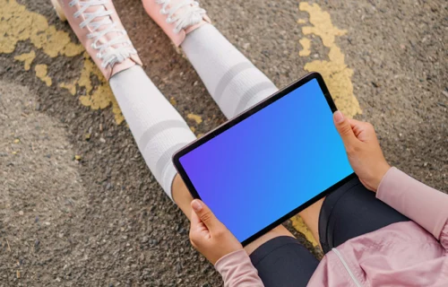 Woman reading on an iPad mockup