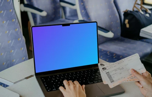 Woman typing on a MacBook Pro 14 mockup