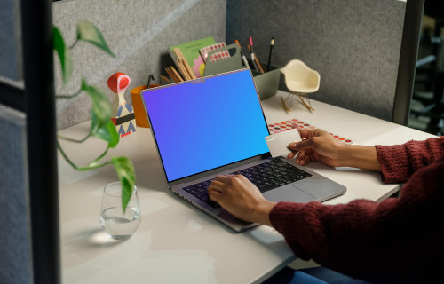 Woman working on a MacBook Pro 14 mockup
