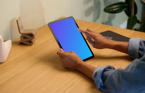 Woman working on an iPad Air mockup