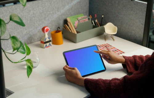 Woman working on an iPad Air mockup
