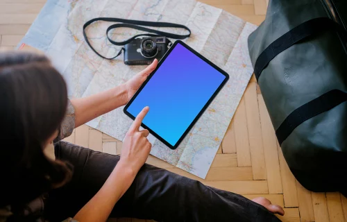 Woman working on an iPad Air mockup
