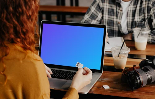 Woman working on MacBook Pro mockup
