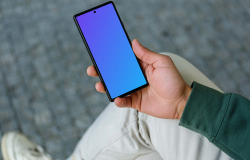 Young man reading on Google Pixel 6 mockup