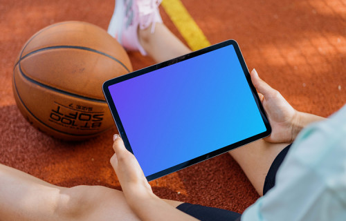 Young woman reading on an iPad mockup