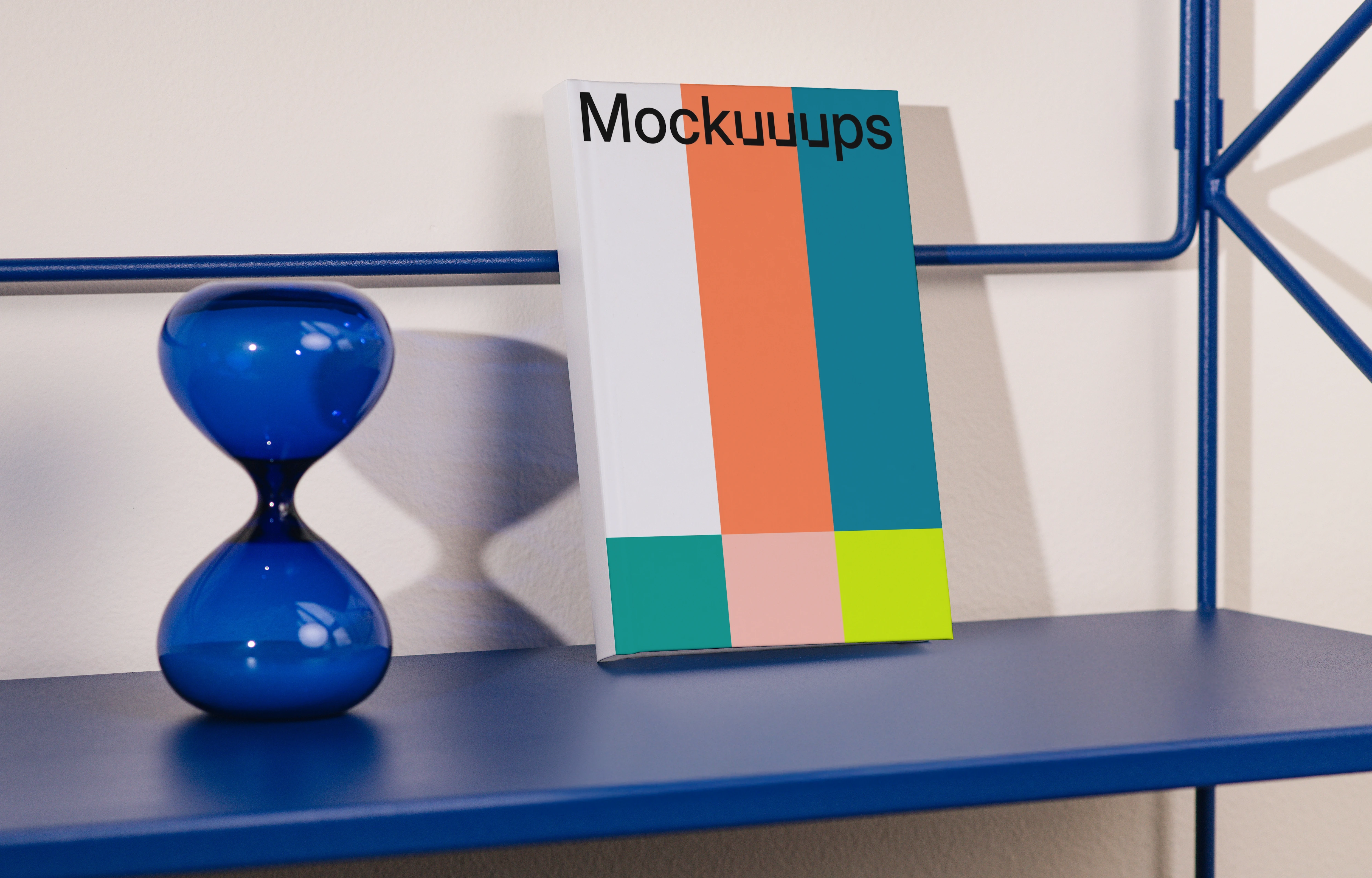 Book mockup on a modern blue shelf