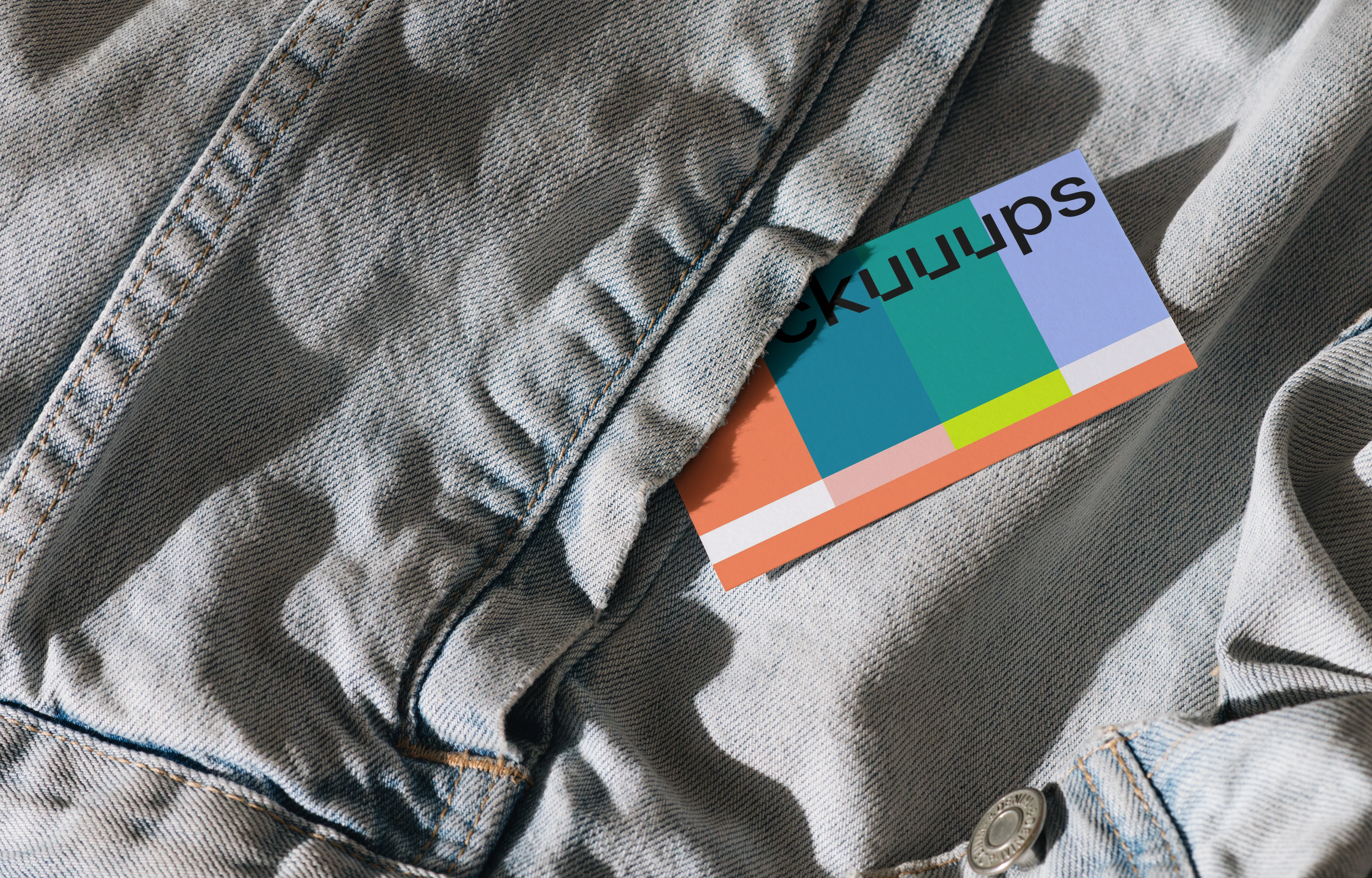 EU business card mockup on denim fabric