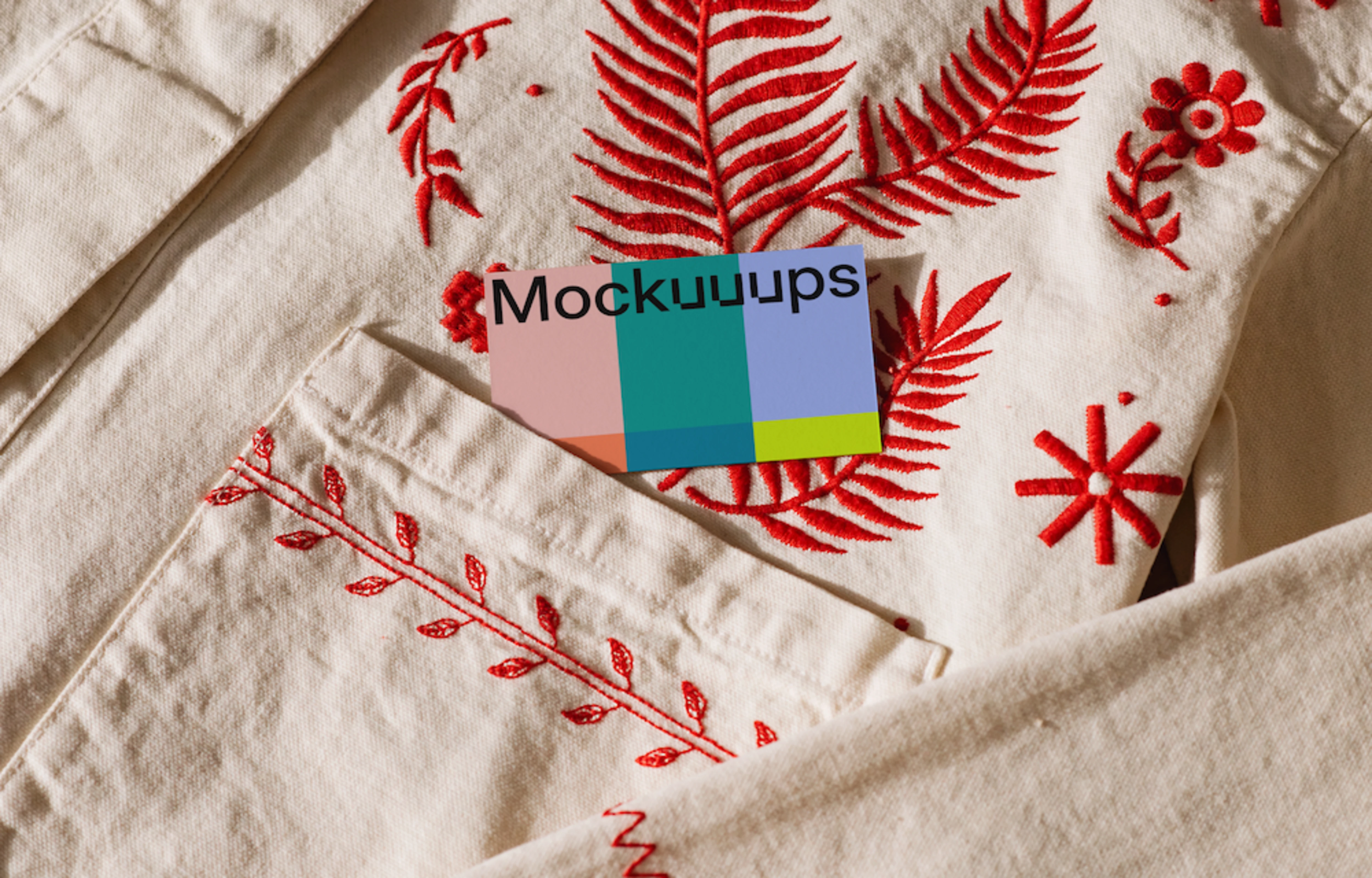 EU business card mockup on embroidered fabric